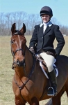Seventeen-year-old Denya Dee Leake, wearing the just-awarded colors and buttons of the Blue Ridge Hunt, led the Junior Field Masters Chase on her Cleveland Bay-Thoroughbred cross, Fearnought.