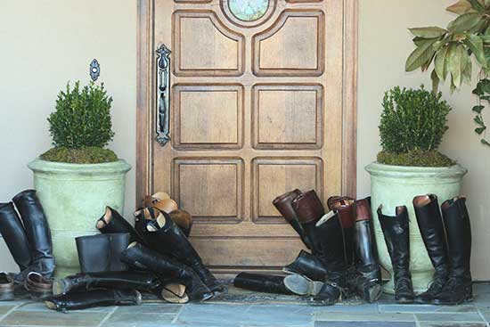 riding boots by door